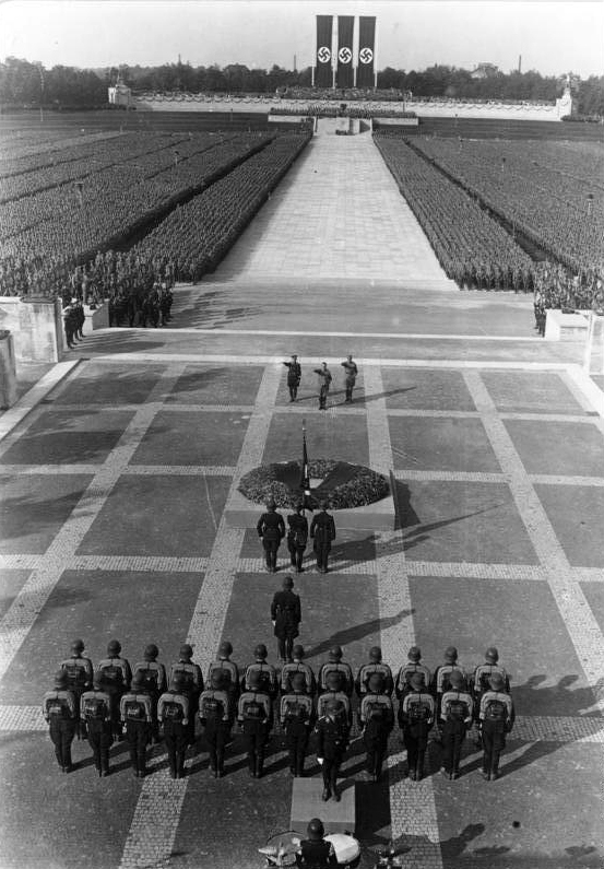  Image: Bundesarchiv, Bild 102-04062A / [CC-BY-SA 3.0](https://creativecommons.org/licenses/by-sa/3.0/de/deed.en), via [Wikimedia](https://commons.wikimedia.org/wiki/File:Bundesarchiv_Bild_102-04062A,_Nürnberg,_Reichsparteitag,_SA-_und_SS-Appell.jpg)