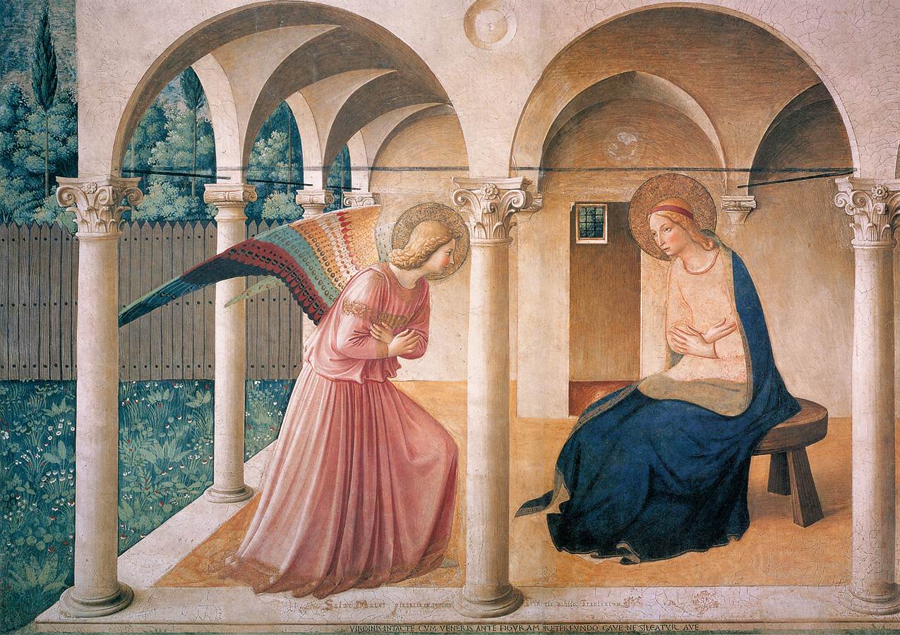 A Renaissance fresco painting by Fra Angelico depicting the Annunciation. The angel Gabriel, with multicolored wings and a pink robe, bows respectfully as he delivers his message to the Virgin Mary, who sits calmly on a wooden bench with arms folded, wearing a dark blue cloak. Both figures have golden halos. The scene takes place under an arched portico with Corinthian columns, and a serene garden is visible in the background. _The Annunciation_ by Fra Angelico (1438-1450) via [Wikimedia Commons](https://commons.wikimedia.org/wiki/File:Fra_Angelico_-_The_Annunciation_-_WGA00555.jpg)